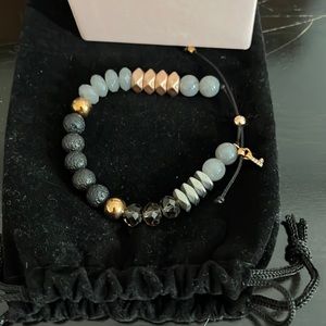 Stella & Dot Beaded Intention Bracelet on stretch black cord.